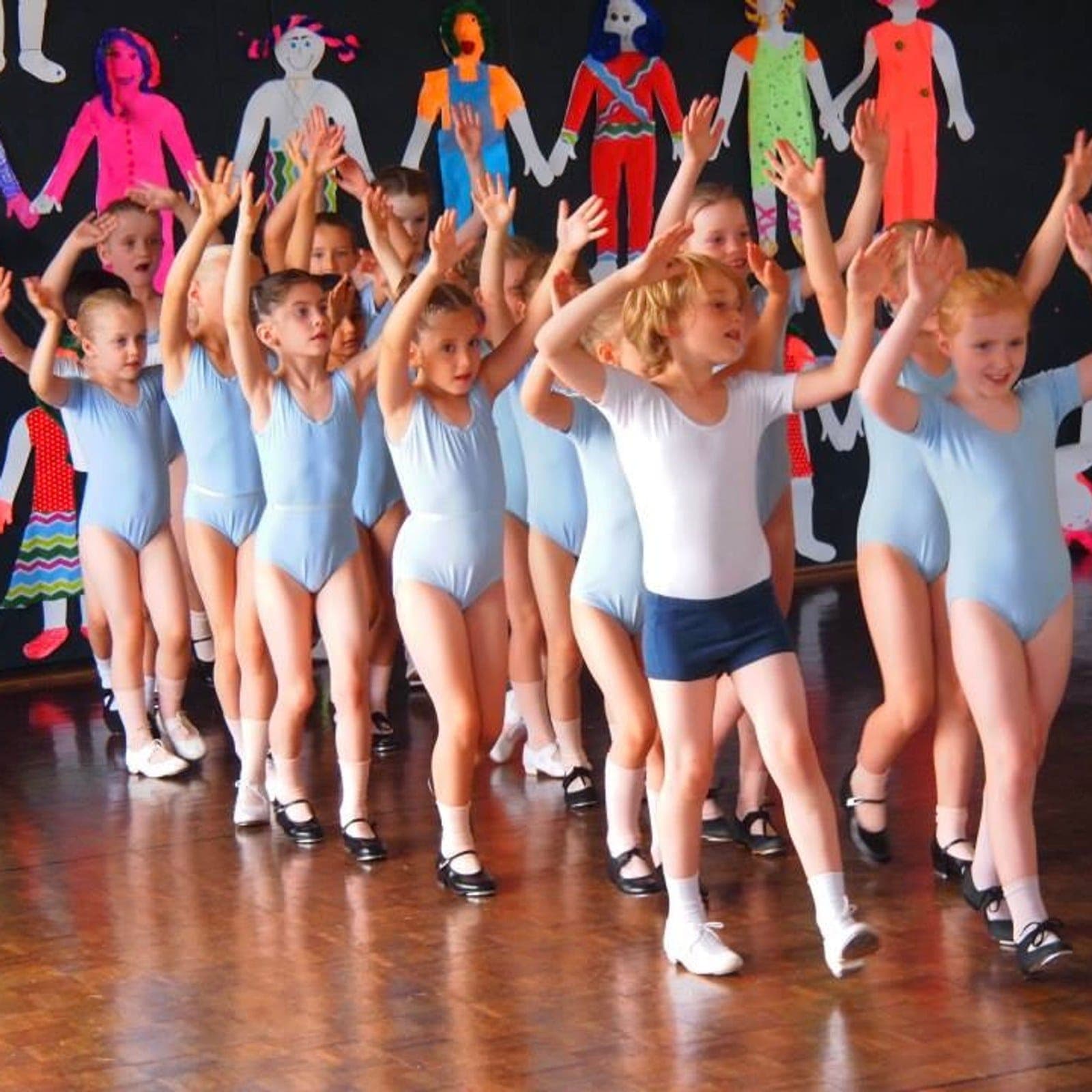 Junior tap class on stage