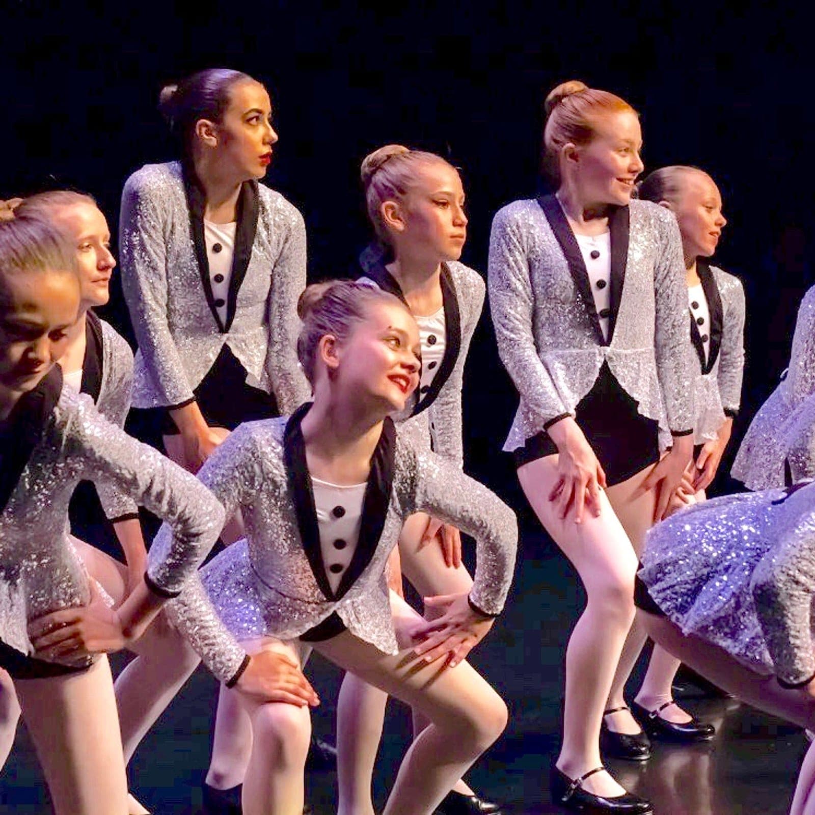 Jazz dancers in sequin jackets